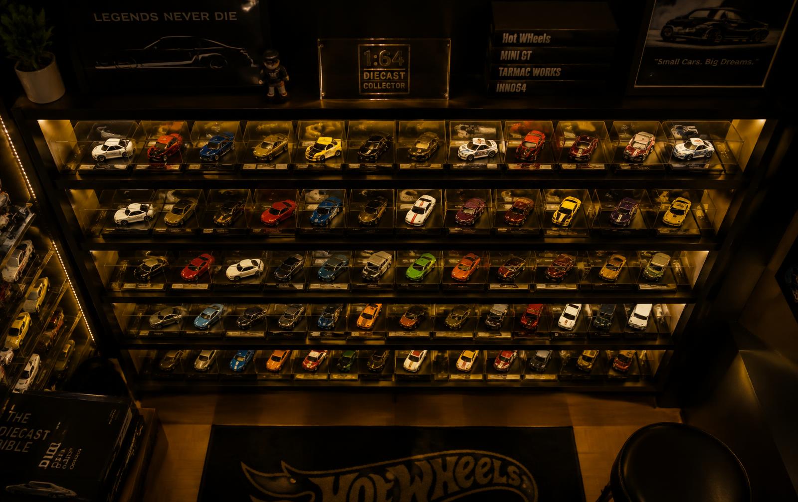 Collector display shelves full of 1:64 scale diecast cars